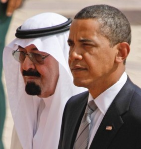 King Abdullah of Saudi Arabia welcomes President Barack Obama upon his arrival in Riyadh, Wednesday, June 3, 2009. (AP Photo/Hassan Ammar)