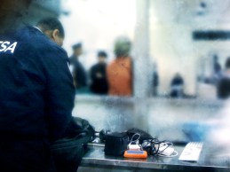 TSA Employee Checking Devices